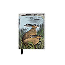 A hardcover 2027 pocket diary featuring an illustrated cover with two hares in a grassy field beside a lake, Artwork by Angela Harding, Ratling Hares. Shown on a plain white background.
