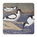 Square tablemat featuring lino print form Sue Welfare of avocets on waters edge with grass background. 