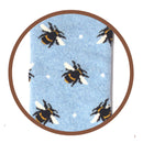 Bartleby’s light blue Funky Welly Socks with a close up of the repeating bumble bee pattern.