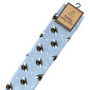 Bartleby’s light blue Funky Welly Socks with a repeating bumble bee pattern.