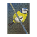 A completed jigsaw puzzle featuring a blue tit perched on a branch, set against a dark textured background.
