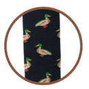 Bartleby’s navy Funky Welly Socks with colourful mallard duck pattern. A close-up of a dark navy sock with a repeating pattern of mallards. 