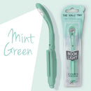 Mint Green Really Tiny booklight from comany called IF in packaging and shown with light on.