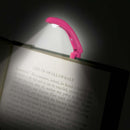 Really Tiny booklight Pink from Campany called IF. Clipped ot a book in the dark to show reading in the dark light.
