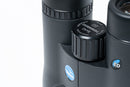 Close-up of a black Vortex binocular with textured adjustment knobs, featuring the blue Vortex logo and an ED coating badge on a white background.