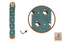 Bartleby’s green Funky Welly Socks with a repeating pattern of puffins. 