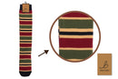 Bartleby’s Striped Funky Welly Socks for men with a repeating pattern of red, green, beige and black srtipes. 