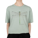 A light green t-shirt with a dragonfly design in sizes S, M, L and XL Adults