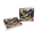 A stack of illustrated greeting cards and a single card displayed on a clean white background. The cards feature a detailed vintage-style illustration of two flying ducks in a landscape with trees, water, and autumn foliage.