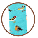 Bartleby’s Funky Welly Socks bright turquoise/ light green with a repeating garden bird print close up.