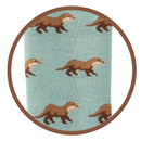 Bartleby’s light blue Funky Welly Socks with a close up of the repeating otter pattern.